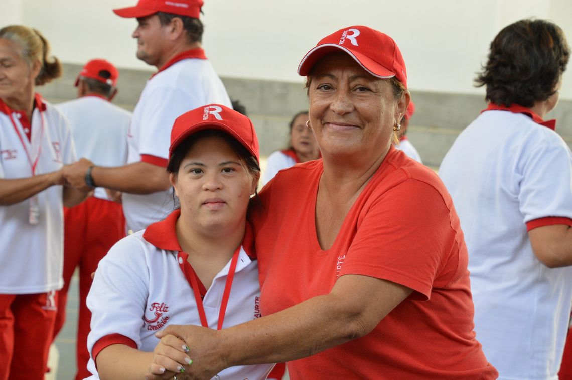 A mother hugs her daughter, who has Down's syndrome